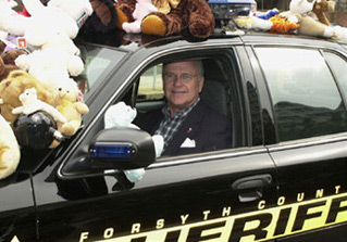 Sheriff William T. Schatzman in Patrol Car